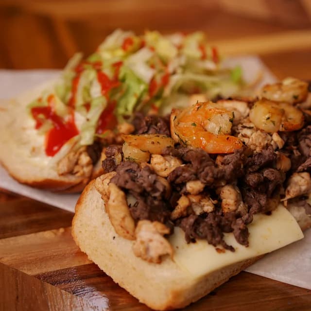Mal y Tierra — Surf & Turf · Bistec y Camarón. Authentic Puerto Rican food at El Punto Sandwichera, Allentown, PA.