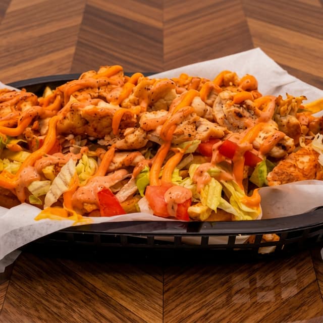 Papas Locas Pollo — Loaded Fries · Chicken. Authentic Puerto Rican food at El Punto Sandwichera, Allentown, PA.